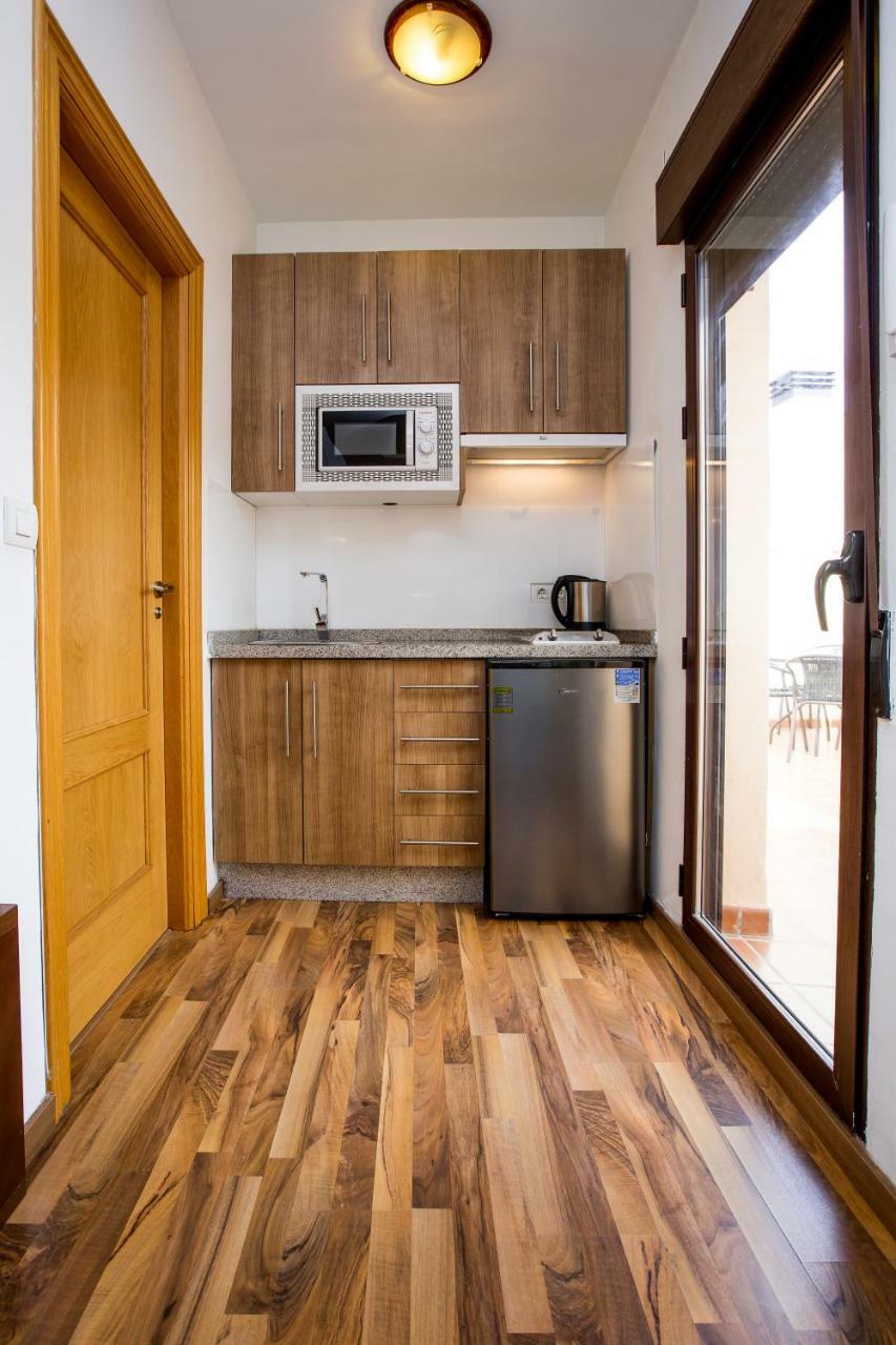 Apartamentos Casa De La Lonja กรานาดา ภายนอก รูปภาพ